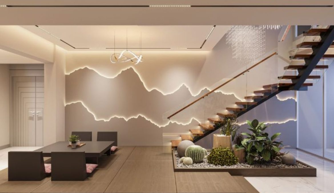 Zona living moderna con scala in legno e illuminazione a LED integrata nella parete e sul soffitto, per un''illuminazione in casa dal design contemporaneo e con giochi di luce.